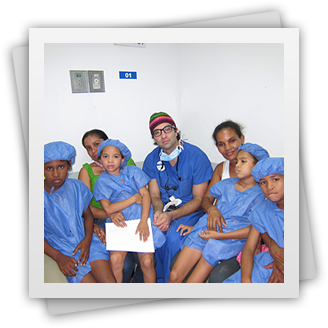 Dr. Rahban and group of kids in Guatemala getting prepped for reconstructive surgery
